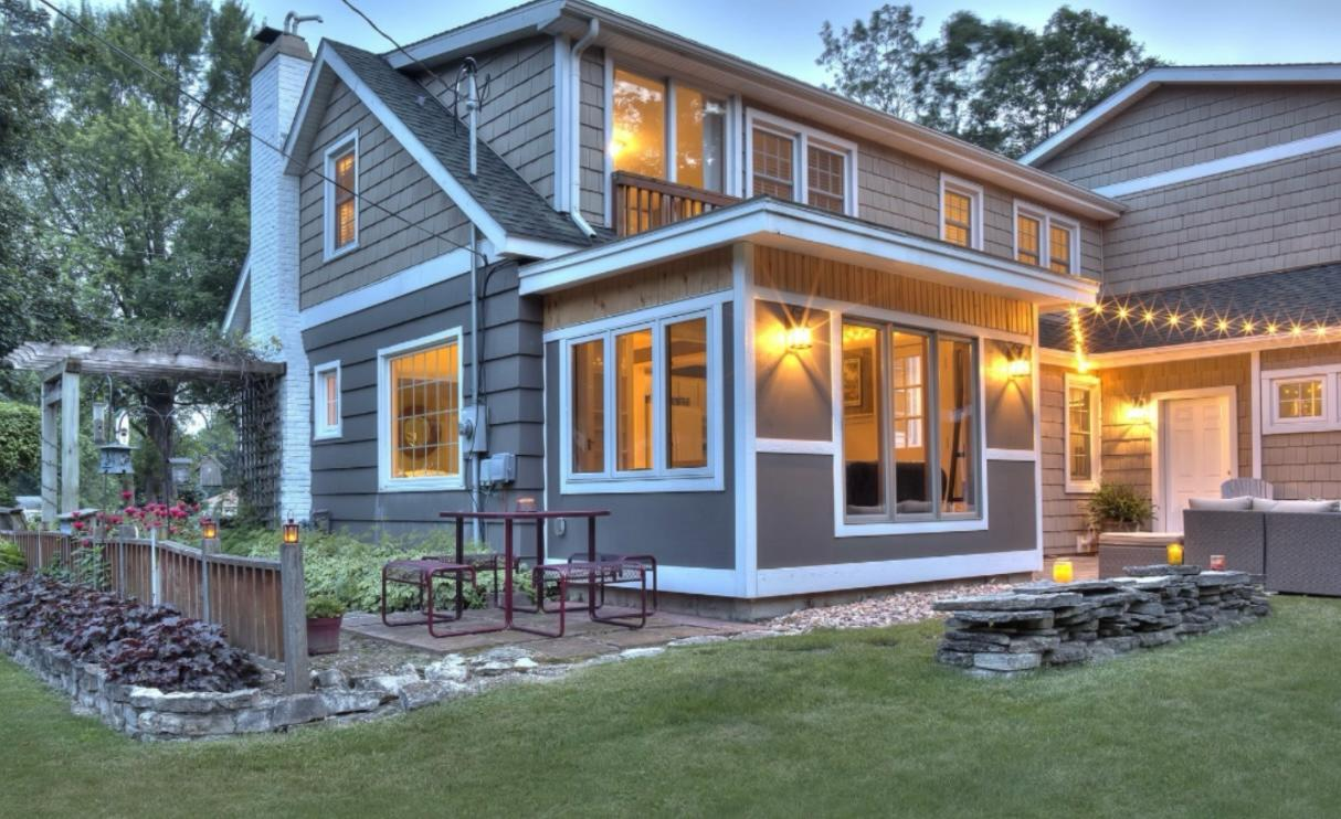Home lit up at dusk