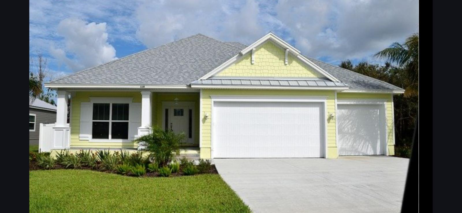 Coastal Florida home with a three-car garage